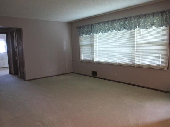 Living room view with large lookout windows!