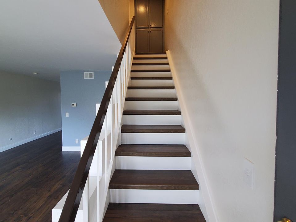 Stairs leading up to the 2 bedrooms and full bathroom