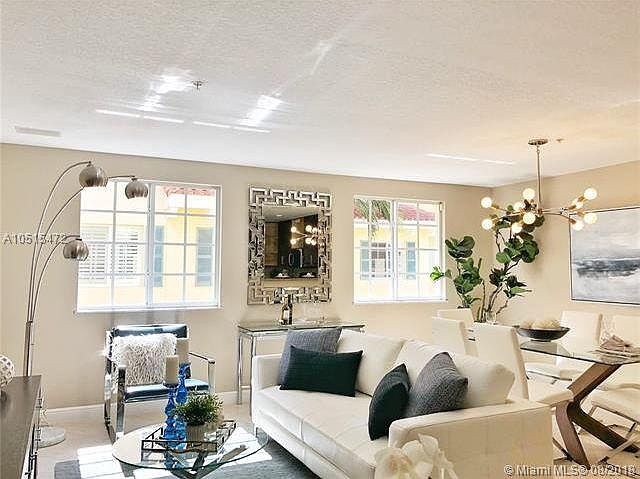 Living and dining room, kitchen is to the right of this