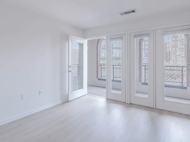 Bedroom with Balcony and Hard Surface Flooring