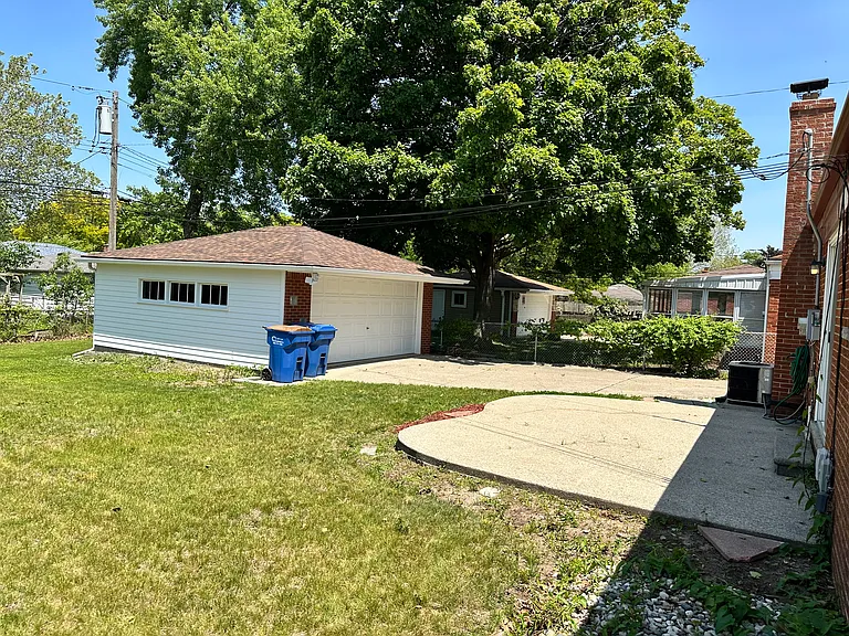 Back Patio and Two Car Garage