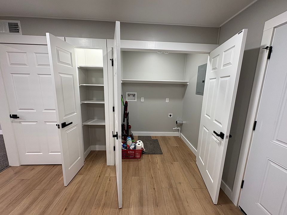 Utility closet, pantry & laundry room with washer/dryer hookups