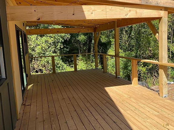 Deck for days. Plenty of covered deck are for dining and entertaining year round.