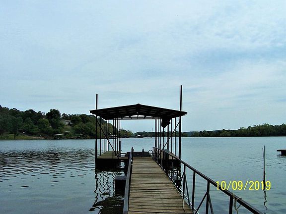 Dock with a lift is included with property.