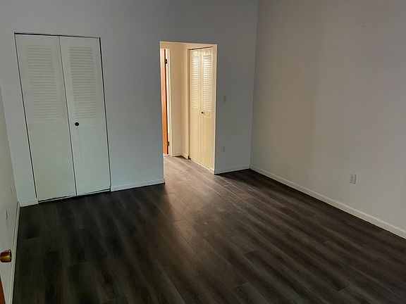 Bedroom includes 3 bifold door closets