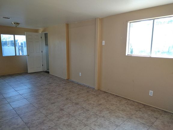 Living room, door to the right is the laundry room