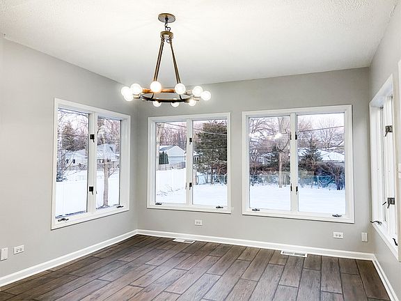 dining area overlooking large backyard