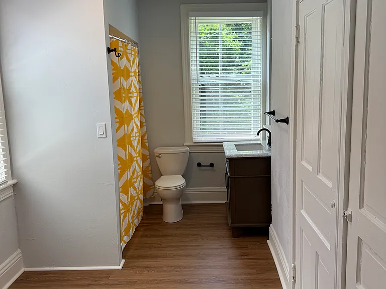 Two large bathrooms closets on right