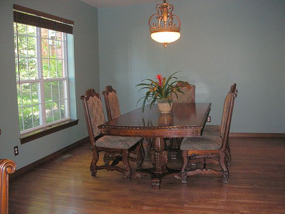 Dining Room-Wood Flooring & Large Windows