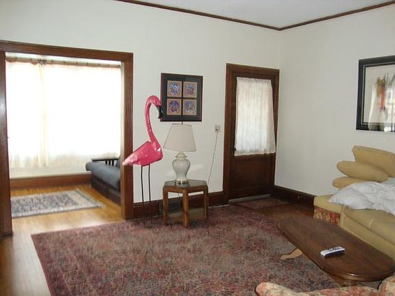 Great big living room as you walk in with vintage rug