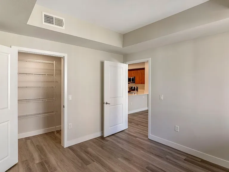 Renovated Package I bedroom with hard surface flooring