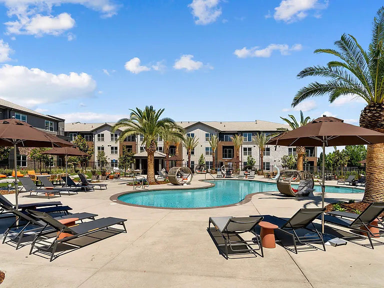 Enjoy sunny days relaxing by the resort-style pool