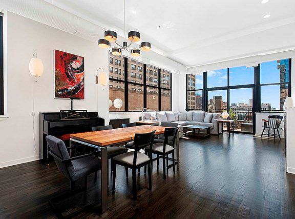 The tall 11 foot ceilings give this place a light and airy feel while the concrete between the floor