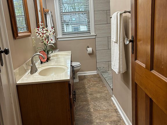 Bathroom with double sink and new walk in shower. Shower door to be installed soon.