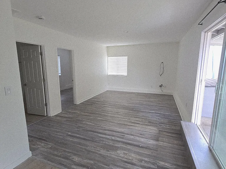 Private suite living quarters featuring sliding door to backyard covered patio