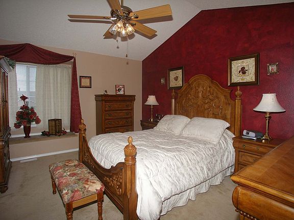 Upstairs master suite with double vanities, soaking tub, and walk-in closet