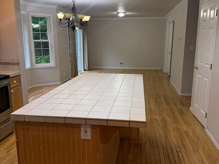 Kitchen looking into the dining room and living area