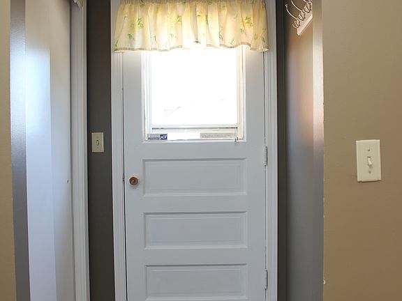 Door leading to fenced yard