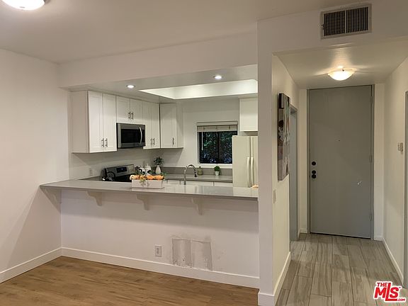 5th image of 3480 Barham Blvd APT 207