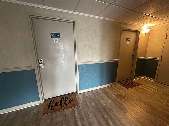 Both doors belong to unit