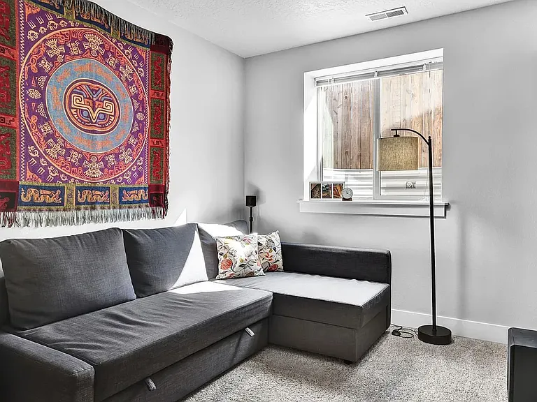 1st bedroom downstairs can be used as a gathering room or a bedroom.