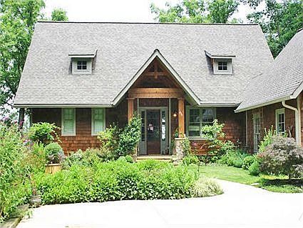 Front view of this lake house on 2 acres.