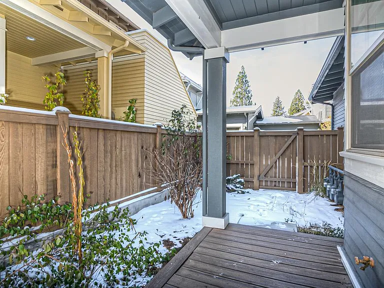 Back porch and fenced yard