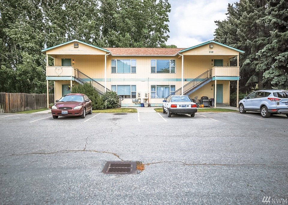 Producing income property, private setting, large treed parcel