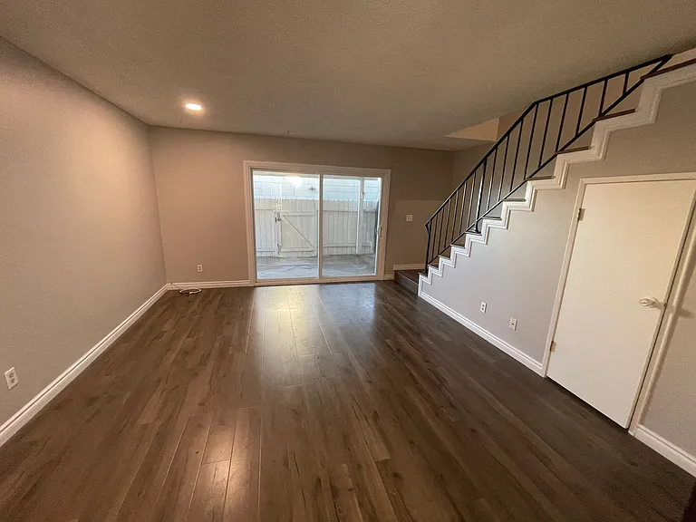 Living and Patio Door to Patio