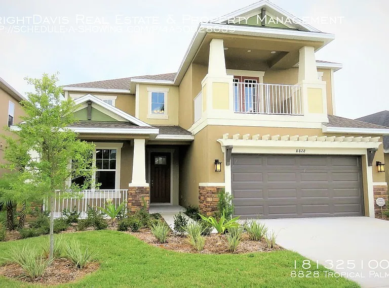 8828 Tropical Palm Dr — Photo 1