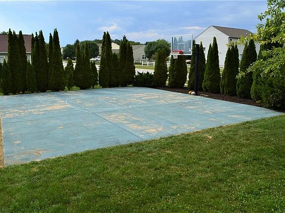 At home play! Awesome Basketball Court, this is Hoosier Land at its best! Perfect back yard for entertaining. Court is a great place for yard parties and gatherings as well.