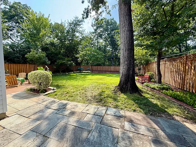 View of the backyard from the slate patio
