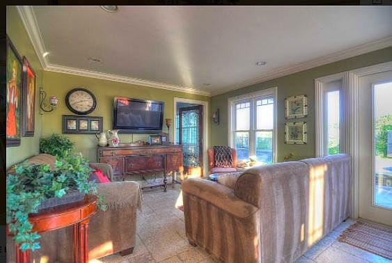 Back TV room with door to the office 