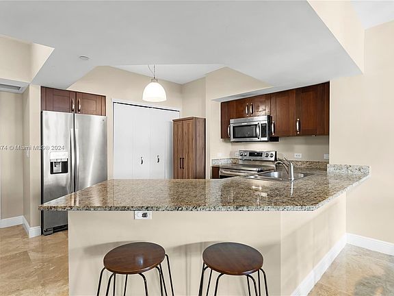 3rd image of 19900 E Country Club Dr APT 518