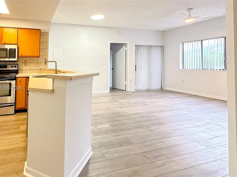2445 SW 18th Ter #107 — Photo 1