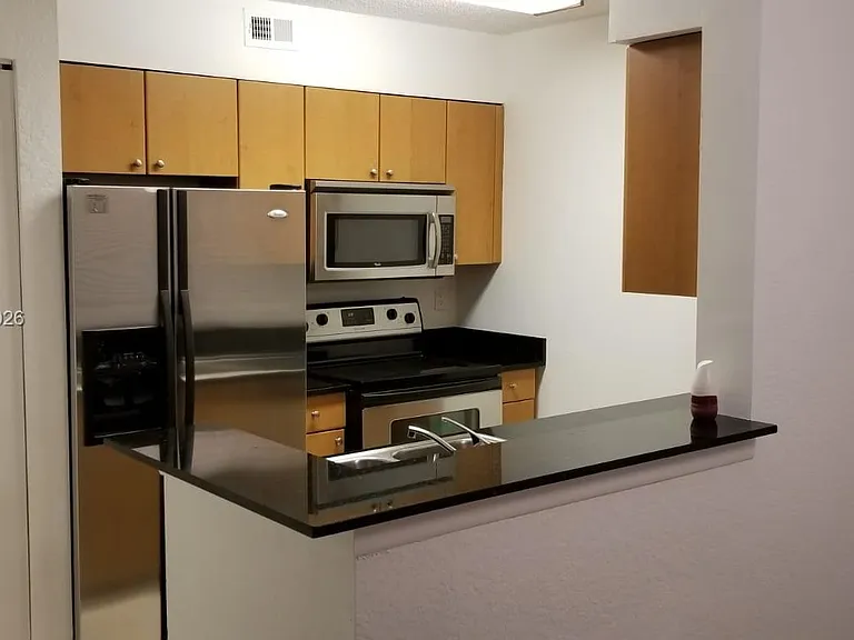 2811 N Oakland Forest Dr #105 — Photo 3