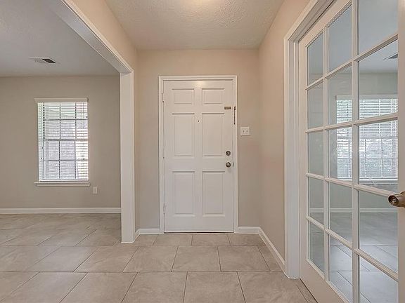 Step through the elegant front door into a home filled with style, comfort, and thoughtful upgrades. A warm welcome awaits you!