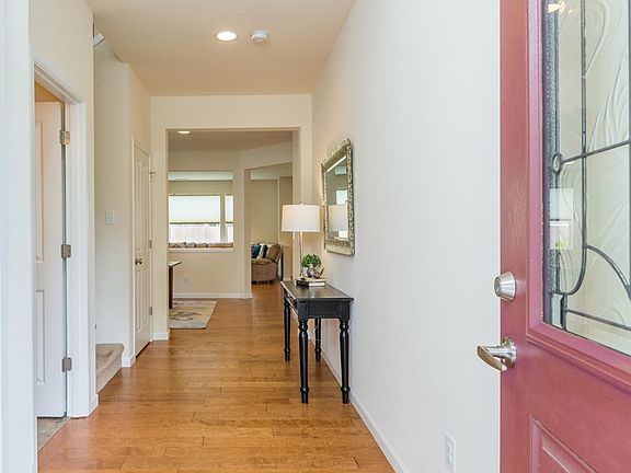 Elegant 2-Story Entry - Open to 2nd Floor - Rich Hardwood Floors Extend thru to Dining Room, Living Room & Kitchen.