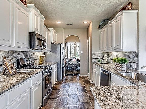 Drawings, pictures, photographs, videos, square footages, floor plans, elevations, features, colors and sizes are for illustrati