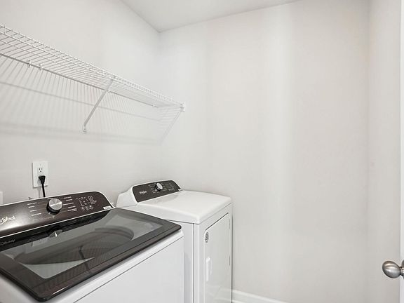Enjoy laundry day with space to fold or sort clothes and organize essentials.