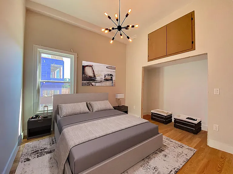 one of the 3 equally sized bedrooms- closet has been finished out with doors and closet system