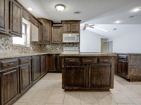 5th image of 3403 Avenue K 1/2