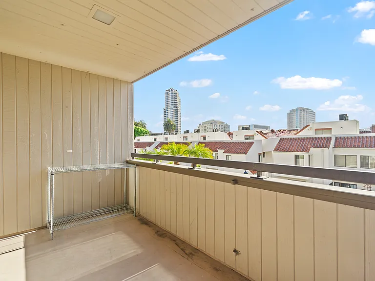Spacious balcony with views of downtown