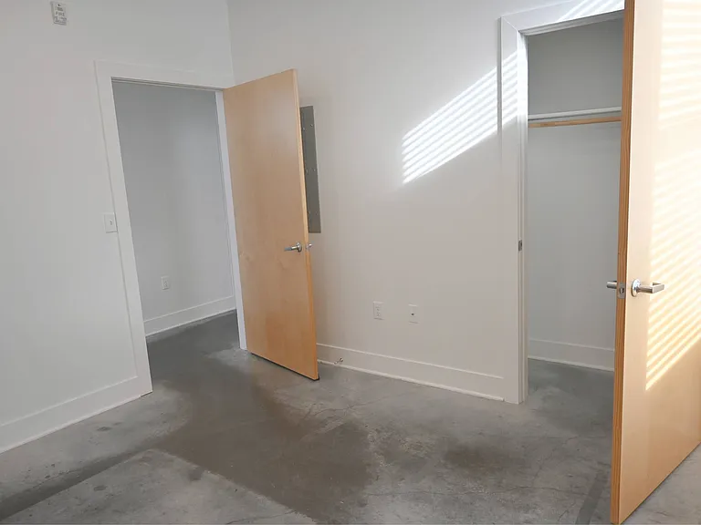 Bedroom and closet at The Sawyer.