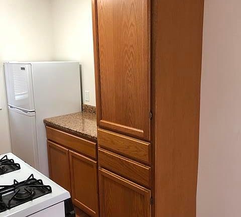 Newer refrigerator, extra counterspace and pantry