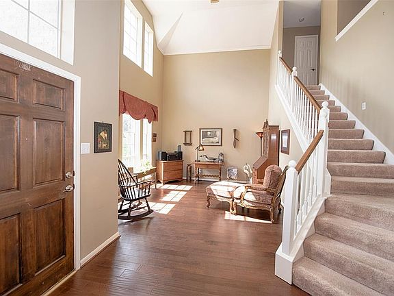 Entry to the home is a gorgeous foyer as you are greeted by the formal living area.