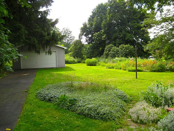 Spacious deep yard with gardens