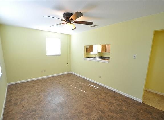 DEn opens to the kitchen. Tile floors.