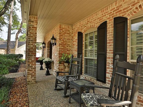 Charming front porch perfect for relaxing and enjoying the landscaping. this home is perfectly located in a quiet cul de sac