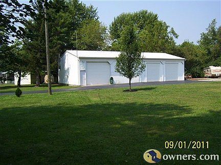 full view of garage and pole barn